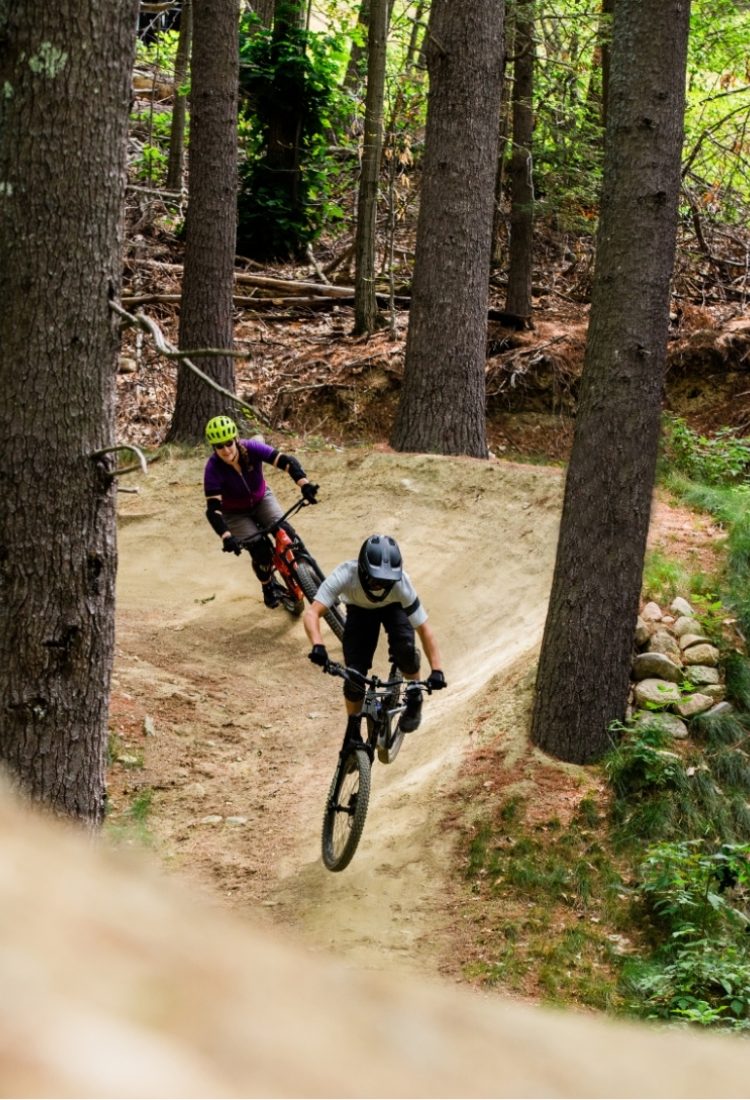 two riders on downhill flow trail